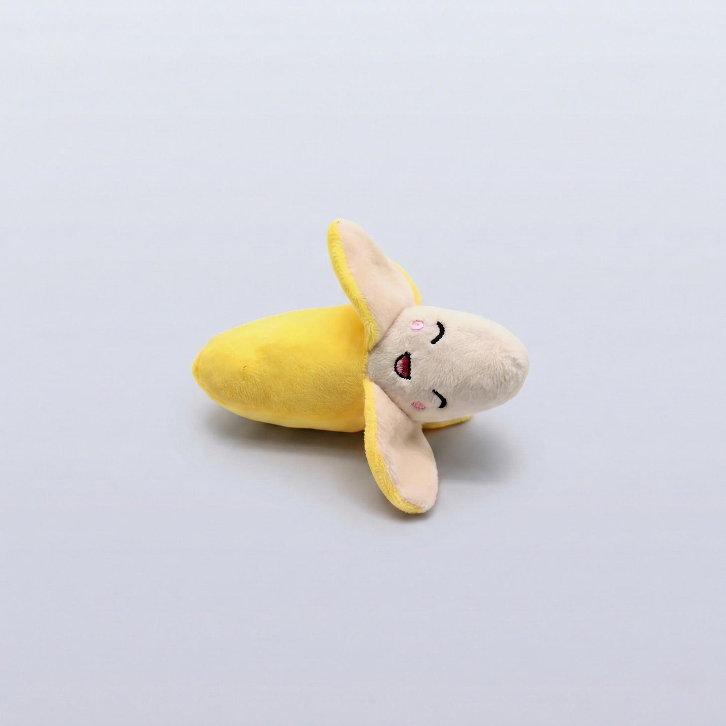 Brinquedo de banana para gatos morder

