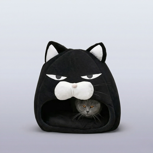 Cama para gatos preta em fundo neutro 
