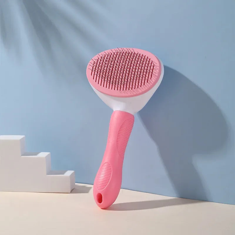 Escova para gatos rosa
