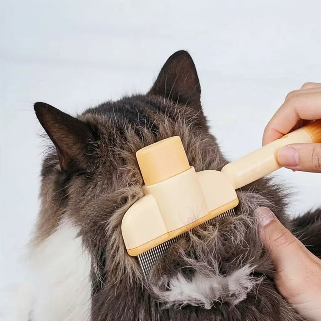 Pente para gatos amarelo removendo pelos