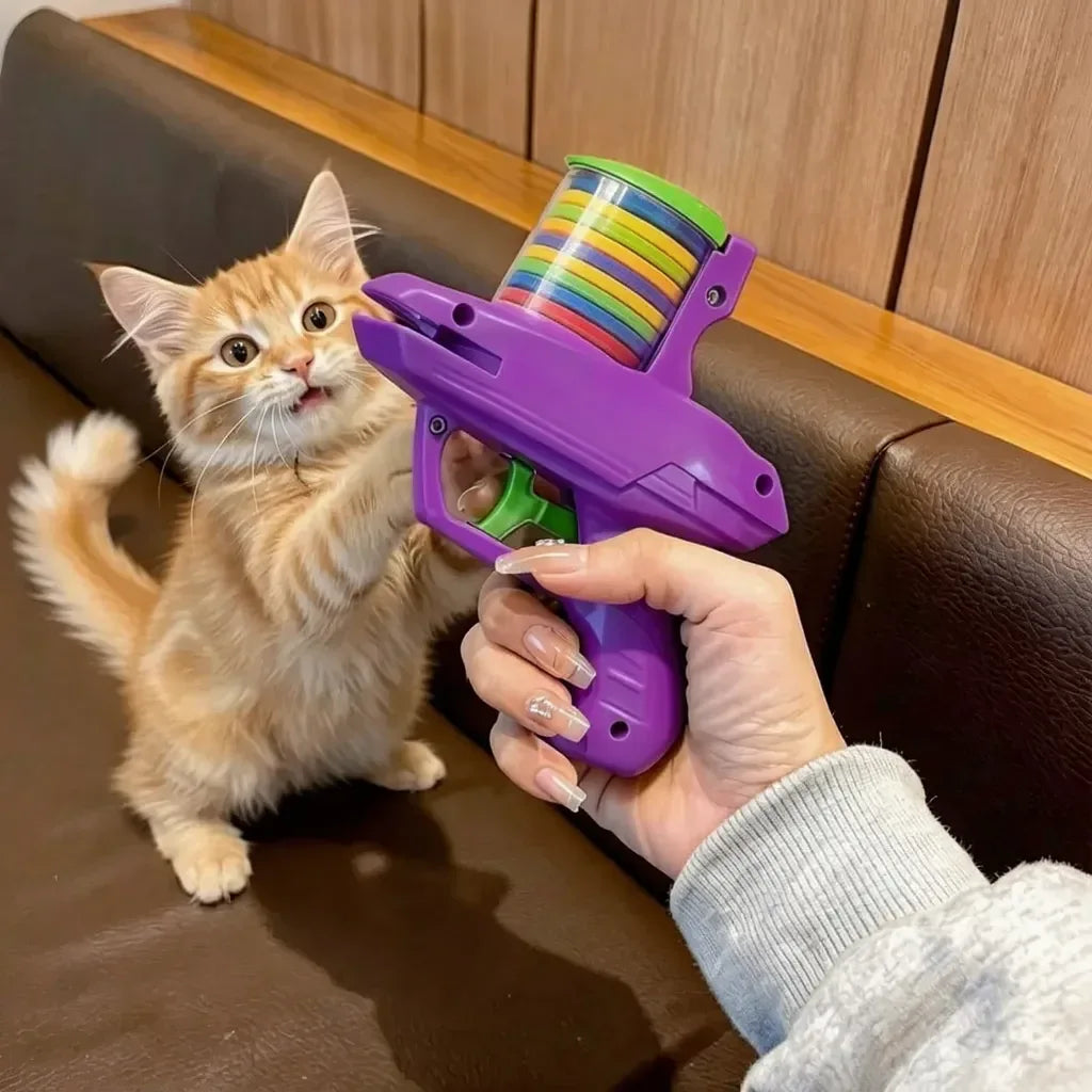 Brinquedo para gatos lançador de discos roxo com gato brincando e interagindo