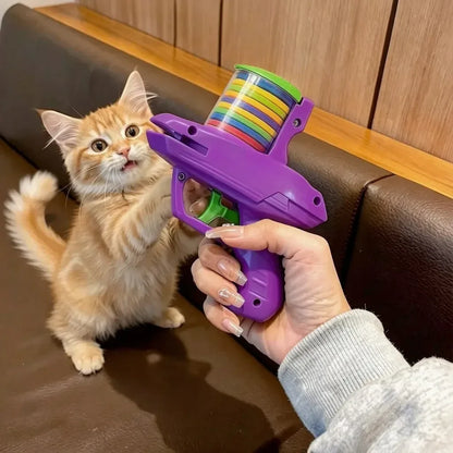 Brinquedo para gatos lançador de discos roxo com gato brincando e interagindo